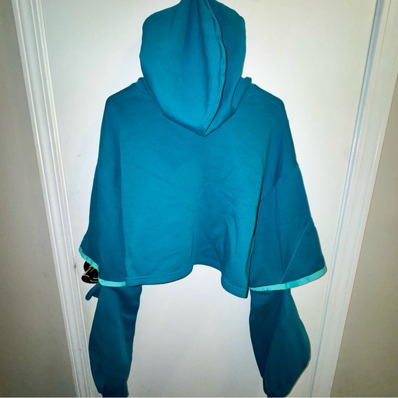 Reebok x Cardi B Teal Cropped Hoodie w/ Open Elbows - Picture 15 of 15
